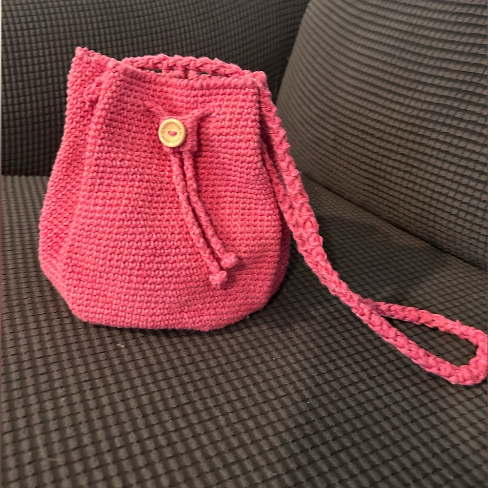 Pink handwoven crossbody bag